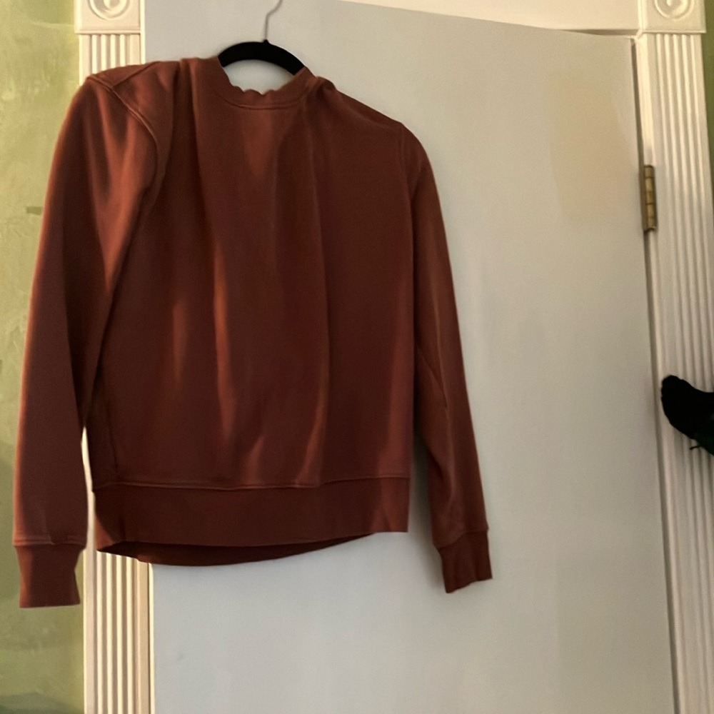 Rust colored women’s sweater